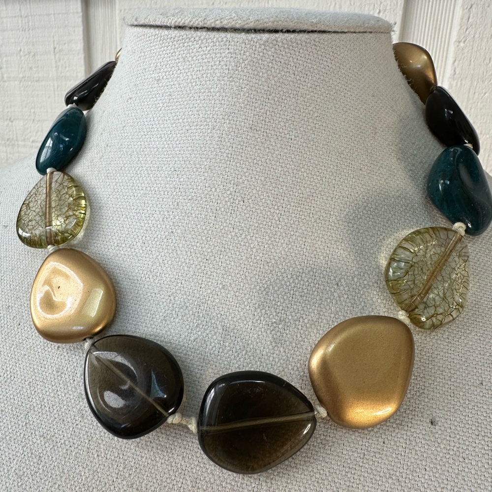 Neutral taupe gold and green statement necklace